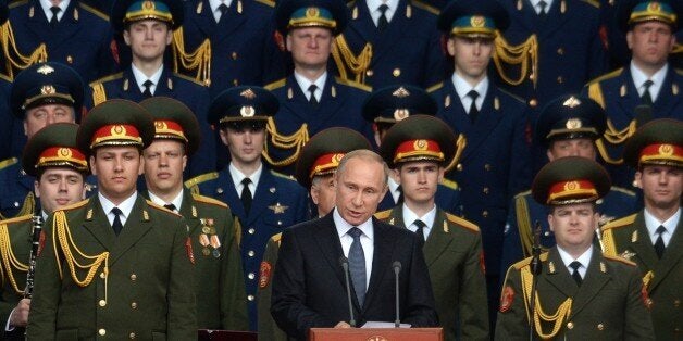 Russian President Vladimir Putin delivers a speech at the opening of the Army-2015 international military forum in Kubinka, outside Moscow, on June 16, 2015. AFP PHOTO / VASILY MAXIMOV (Photo credit should read VASILY MAXIMOV/AFP/Getty Images)