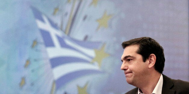 Alexis Tsipras, head of the anti-bailout Syriza party, speaks during a financial conference in Athens on Tuesday, Dec. 2, 2014. Tsipras said that Greeceâs battered economy could not recover unless the money owed to other Eurozone countryâs was cut significantly. The leader of Greeceâs popular left-wing opposition says he will demand a massive debt haircut from bailout lenders if his party comes to power in a possible snap election early next year. (AP Photo/Petros Giannakouris)