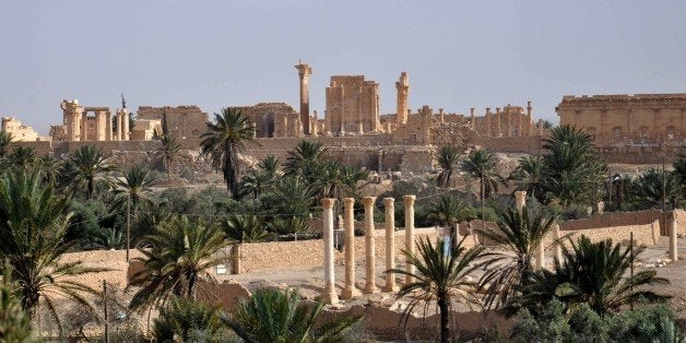 A general view taken on May 18, 2015 shows the ancient Syrian city of Palmyra, a day after Islamic State (IS) group jihadists fired rockets into the city, killing several people. Fierce clashes have rocked Palmyra's outskirts since IS launched an offensive on May 13 to capture the 2,000-year-old world heritage site nicknamed 'the pearl of the desert'. AFP PHOTO /STR (Photo credit should read STR/AFP/Getty Images)