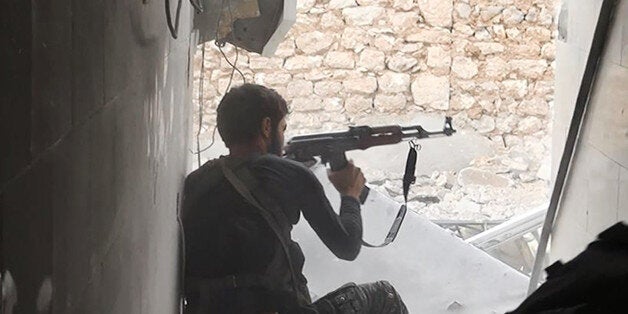 FILE - This undated file photo posted on Monday, Nov. 4, 2014 by the Raqqa Media Office of the Islamic State group, a militan