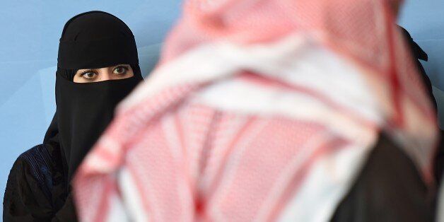 A Saudi woman attends the 9th Global Competitiveness Forum (GCF2015), held in Riyadh, on January 26, 2015. Saudi Arabia's new leadership will push forward efforts to diversify the growing but oil-dependent economy, while easing procedures for investors, senior officials said. The annual event, organised by Saudi Arabian General Investment Authority (SAGIA, brings together high-ranking Saudi officials with world business leaders. AFP PHOTO / FAYEZ NURELDINE (Photo credit should read FAYEZ NURELDINE/AFP/Getty Images)