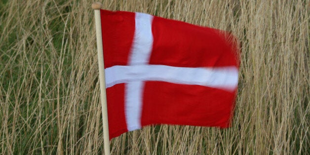 AALBORG, DENMARK - AUGUST 15: A slow-motion photograph of a Danish flag blowing in the wind during the second round of the Made In Denmark at Himmerland Golf & Spa Resort on August 15, 2014 in Aalborg, Denmark. (Photo by Andrew Redington/Getty Images)