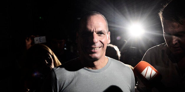 ATHENS, GREECE - JULY 05: Greek Finance Minister Yanis Varoufakis leaves his office as Greek voters are expected to vote no in the Greek austerity referendum, on July 5, 2015 in Athens, Greece. The people of Greece are going to the polls to decide if the country should accept the terms and conditions of a bailout with its creditors. Greek Prime Minister Alexis Tsipras is urging people to vote 'a proud no' to European creditors' proposals, and 'live with dignity in Europe'. 'Yes' campaigners believe that a no vote would mean financial ruin for Greece and the loss of the Euro currency. (Photo by Milos Bicanski/Getty Images)