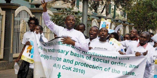 Members of various Christian groups march during a protest against gay and same sex unions in Nairobi, Kenya, Monday, July 6, 2015. A demonstration against homosexuality in Kenya has fizzled after attracting only a handful of protesters. The demonstration by about 35 people Monday was called by the Evangelical Alliance of Kenya and timed to coincide with the visit later this month of U.S. President Barack Obama. The group is calling on Obama not to advocate for gay rights during his visit to Africa July 24-28. (AP Photo/ Khalil Senosi)