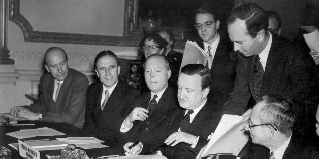 German Debts Agreement signed in London. The signing of the Agreement on German External Depts and of a number of related Agreements took place in London this morning, February 27, 1953, at Londonderry House. The AP-Photo shows: Herr Hermann J. Abs, the German Delegate, about to sign the agreement. Names of others are not mentioned. (AP-Photo)