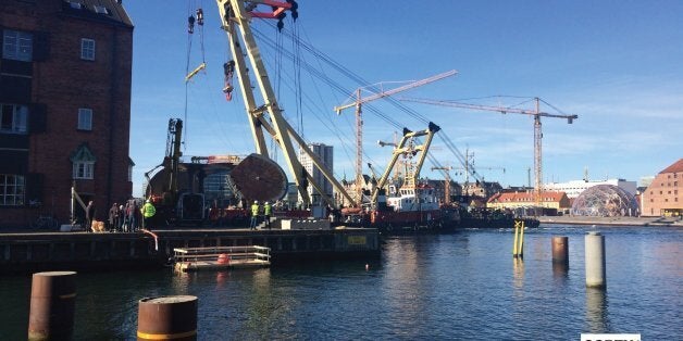 The newest bridge for bikes and pedestrians on Copenhagen harbour - one of seven - being put into place today.Cirkelbroen is designed by Olafur Eliasson.