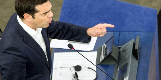 Greek Prime Minister Alexis Tsipras delivers his speech at the European Parliament in Strasbourg, eastern France, Wednesday, July 8, 2015. Tsipras says his country wants a deal that will mean a definitive end to Greeceâs protracted financial crisis, and that last Sundayâs referendum result does not mean a break with Europe. (AP Photo/Jean-Francois Badias)