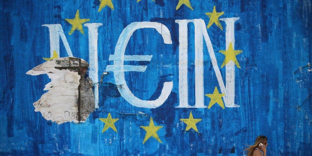 ATHENS, GREECE - JULY 08: The German word 'Nein' which means 'No' sits on graffiti art displaying the European Union (EU) fl