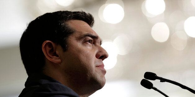 Greece's Prime Minister Alexis Tsipras gives a speech during an economic conference in Athens, on Friday, May 15, 2015. Tsipras said that his countryâs left-wing government is âvery closeâ to reaching a vital deal with bailout lenders, but insists there is âno possibility of retreatâ on demands to further axe pensions and wages.(AP Photo/Petros Giannakouris)