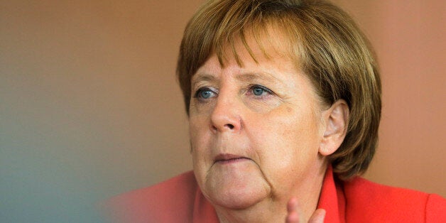 German Chancellor Angela Merkel leads the weekly cabinet meeting at the chancellery in Berlin, Wednesday, July 8, 2015. (AP Photo/Markus Schreiber)