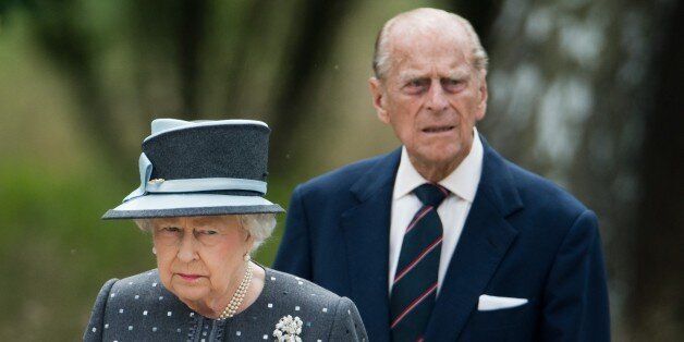 LOHHEIDE, GERMANY - JUNE 26: Queen Elizabeth II and Prince Philip, Duke of Edinburgh visit the concentration camp memorial at Bergen-Belsen on June 26, 2015 in Lohheide, Germany. The Queen and The Duke of Edinburgh viewed the grave of Anne Frank and laid a wreath at the inscription wall, before they met two survivors of the camp and as well as two liberators. This is the final day of a four day state visit, which is their first to Germany since 2004. (Photo by Julian Stratenschulte - Pool/Getty Images)