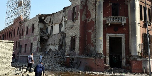 A general view shows the destroyed facade of the Italian consulate building following a powerful bomb explosion, killing one