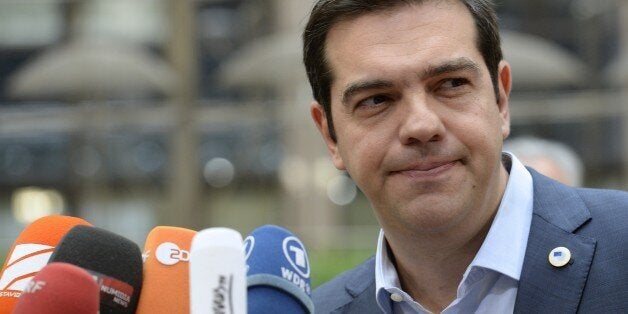 Greek Prime Minister Alexis Tsipras arrives for a meeting of the leaders of the 19 countries that use the euro, in Brussels on July 12, 2015. The EU cancelled a full 28-nation summittoday to decide whether Greece stays in the European single currency as a divided eurozone struggled to reach a reform-for-bailout deal. AFP PHOTO / THIERRY CHARLIER (Photo credit should read THIERRY CHARLIER/AFP/Getty Images)