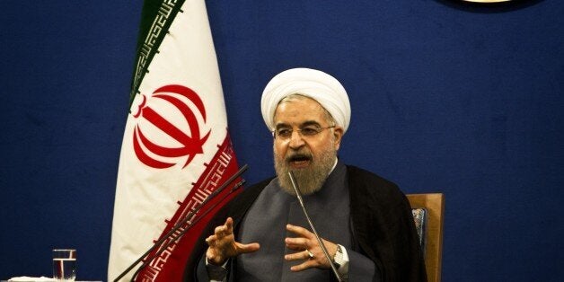 Iranian President Hassan Rouhani speaks during a press conference in Tehran on June 13, 2015. There are still 'many differences over details' of a nuclear deal Iran and world powers are trying to conclude by June 30, Iranian President Hassan Rouhani said. AFP PHOTO / BEHROUZ MEHRI (Photo credit should read BEHROUZ MEHRI/AFP/Getty Images)