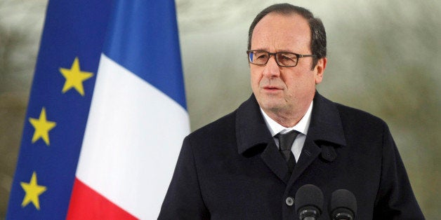 French President Francois Hollande delivers his speech during a ceremony at the Sarre-Union Jewish cemetery, eastern France, Tuesday, Feb. 17, 2015. Hollande noted that anti-Semitism and acts against Muslims are both on the rise in France after the attacks last month in Paris that left 20 people dead, including the three gunmen. The president called on French Jews to remain in France and not follow the Israeli prime minister's call for a mass immigration of European Jews. (AP Photo/Christian Lutz)