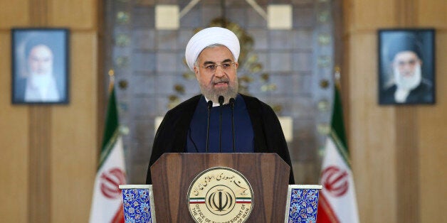 Iran's President Hassan Rouhani addresses the nation in a televised speech after a nuclear agreement was announced in Vienna,