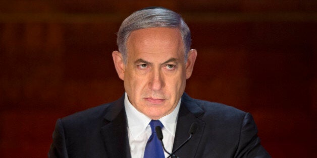FILE - In this Wednesday, April 15, 2015 file photo, Israeli Prime Minister Benjamin Netanyahu looks on as he speaks at the o