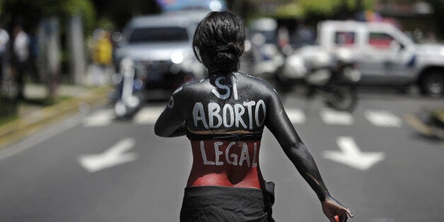 A woman participates in a march on the International Day of Action for the Decriminalization of Abortion, on September 28, 2012 in San Salvador. Salvadorean women marched to ask the government to legalize abortion as a right for women. AFP PHOTO/Jose CABEZAS (Photo credit should read Jose CABEZAS/AFP/GettyImages)