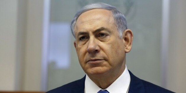 Israeli Prime Minister Benjamin Netanyahu chairs the weekly cabinet meeting at his Jerusalem office on August 2, 2015. AFP PHOTO / POOL / GALI TIBBON (Photo credit should read GALI TIBBON/AFP/Getty Images)