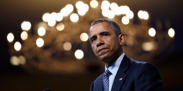 President Barack Obama pauses while speaking at the Young African Leaders Initiative (YALI) Mandela Washington Fellowship Presidential Summit in Washington, Monday, Aug. 3, 2015. (AP Photo/Susan Walsh)