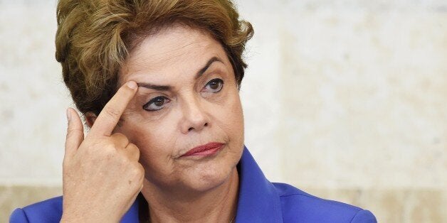 Brazilian President Dilma Rousseff speaks during meeting of the Vocational Education Project for Young People, the Pronatec, at Planalto Palace in Brasilia on July 28, 2015. Seeking to improve her popularity, currently about 7% of the population considered good or excellent, the President Rousseff will launch a campaign on social medias with videos that show the action of her government. AFP PHOTO / EVARISTO SA (Photo credit should read EVARISTO SA/AFP/Getty Images)