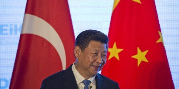 Chinese President Xi Jinping speaks at the Turkey-China Business Forum in Beijing on July 30, 2015. AFP PHOTO / POOL (Photo credit should read NG HAN GUAN/AFP/Getty Images)