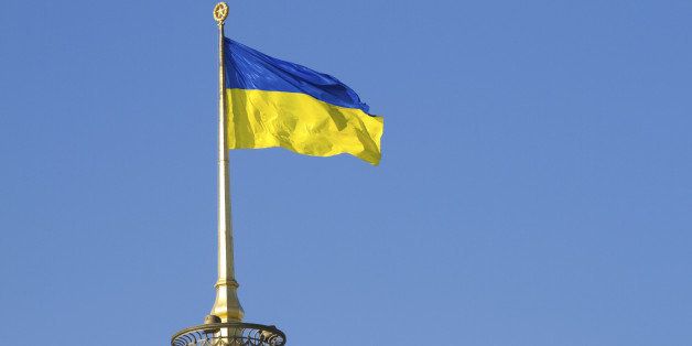 Ukrainian flag on a parliament roof in Kiev