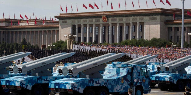 BEIJING, CHINA - SEPTEMBER 03: Chinese missiles are seen on trucks as they drive next to Tiananmen Square and the Great Hall