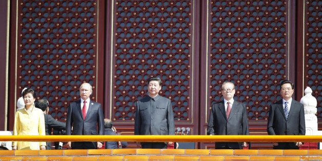 BEIJING, Sept. 3, 2015 -- Chinese President Xi Jinping, center, former presidents Jiang Zemin, second right, and Hu Jintao, first right, Russian President Vladimir Putin, second left, and President Park Geun-hye of the Republic of Korea watch the military parade during the commemoration activities to mark the 70th anniversary of the victory of the Chinese People's War of Resistance Against Japanese Aggression and the World Anti-Fascist War, in Beijing, capital of China, Sept. 3, 2015. (Xinhua/Ju Peng via Getty Images)