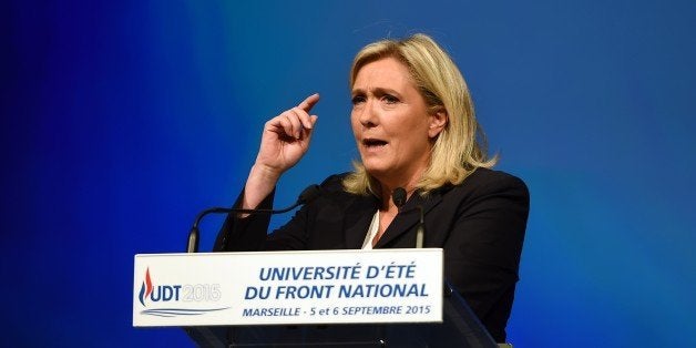 French far-right Front National party's president Marine Le Pen delivers a speach during the summer far-right National Front (FN) congress in Marseille on September 6, 2015. AFP PHOTO / ANNE-CHRISTINE POUJOULAT (Photo credit should read ANNE-CHRISTINE POUJOULAT/AFP/Getty Images)