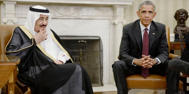 U.S. President Barack Obama, right, listens as King Salman bin Abdulaziz Al Saud of Saudi Arabia speaks during a meeting in t