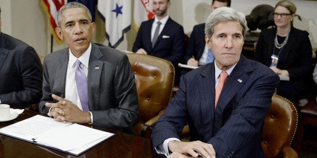 WASHINGTON, DC - SEPTEMBER 10: U.S President Barack Obama and Secretary of State John Kerry (R) meet with a small group of ve
