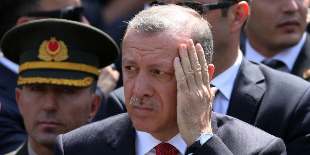 Turkey's President Recep Tayyip Erdogan attends funeral prayers for Okan Tasan, a Turkish army officer killed in a Kurdish rebel attack, at the Kocatepe Mosque in Ankara, Turkey, Thursday, Sept. 10, 2015. Sixteen soldiers were killed and six others were wounded in a Kurdish rebel attack against troops in southeast Turkey on Sunday.(AP Photo/Burhan Ozbilici)