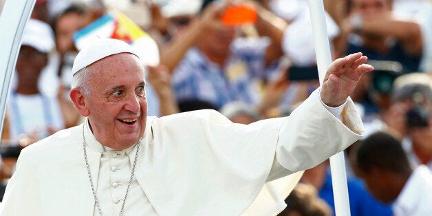 Pope Francis arrives to celebrate Mass in Revolution Square in Havana, Cuba, Sunday, Sept. 20, 2015. Pope Francis opens his first full day in Cuba on Sunday with what normally would be the culminating highlight of a papal visit: Mass before hundreds of thousands of people in Havana's Revolution Plaza. (Tony Gentile/POOL via AP)