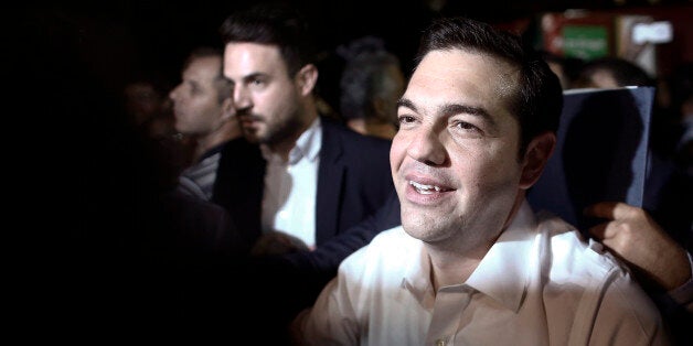 Alexis Tsipras, former Greek prime minister and leader of the Syriza party, arrives to speak at his final pre-election rally in Athens, Greece, on Sunday, Sept. 20, 2015. Greeks began voting Sunday in a general election to determine who will lead efforts to implement European bailout agreements and restore economic normalcy to the continent's most indebted country. Photographer: Kostas Tsironis/Bloomberg via Getty Images
