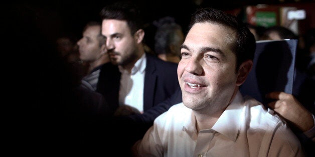 Alexis Tsipras, former Greek prime minister and leader of the Syriza party, arrives to speak at his final pre-election rally in Athens, Greece, on Sunday, Sept. 20, 2015. Greeks began voting Sunday in a general election to determine who will lead efforts to implement European bailout agreements and restore economic normalcy to the continent's most indebted country. Photographer: Kostas Tsironis/Bloomberg via Getty Images 