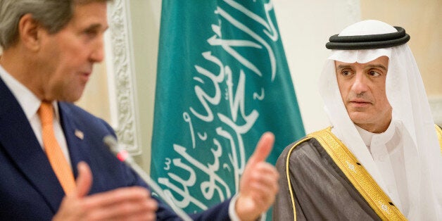 U.S. Secretary of State John Kerry, left, and Saudi Foreign Minister Adel al-Jubeir, right, hold a joint news conference at R