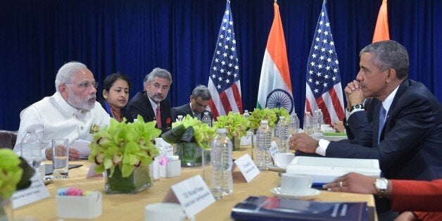 India's Prime Minister Narendra Modi(L) speaks during a bilateral meeting with US President Barack Obama (R) at the United Na