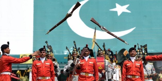 Pakistani Rangers march during celebrations to mark the countrys Defence Day in Lahore on September 6, 2015. Pakistan on September 6 celebrated the 50th anniversary of its second war with arch-rival India weeks after the two nuclear powers faced off in some of their deadliest skirmishes in over a decade. The major fighting of the war took place between August and September 1965 with both sides claiming victory after it ended in stalemate following the intervention of the United States and Soviet Union. AFP PHOTO / Arif ALI (Photo credit should read Arif Ali/AFP/Getty Images)