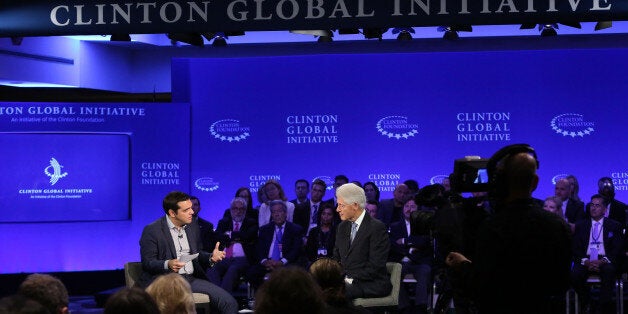 NEW YORK, NY - SEPTEMBER 27: Prime Minister of Greece Alexis Tspiras and Presiden Bill Clinton speak during the 2015 Clinton Global Initiative Annual Meeting at Sheraton Times Square on September 27, 2015 in New York City. (Photo by Taylor Hill/FilmMagic)