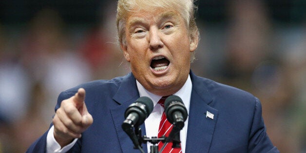 DALLAS, TX - SEPTEMBER 14: Republican presidential candidate Donald Trump speaks during a campaign rally at the American Airlines Center on September 14, 2015 in Dallas, Texas. More than 20,000 tickets have been distributed for the event. (Photo by Tom Pennington/Getty Images)