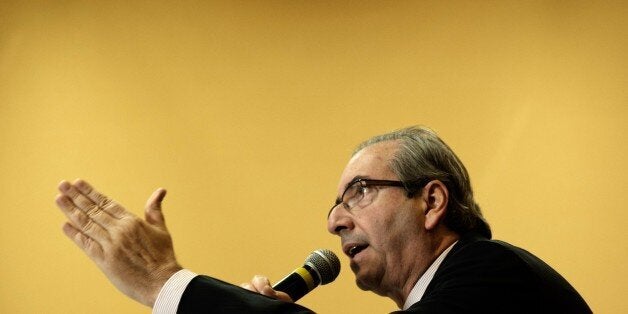 The president of the Chamber of Deputies, Eduardo Cunha, from the Brazilian Democratic Movement Party (PMDB) speaks during a meeting with foreign correspondents in Rio de Janeiro, Brazil, on June 26, 2015. AFP PHOTO / YASUYOSHI CHIBA (Photo credit should read YASUYOSHI CHIBA/AFP/Getty Images)