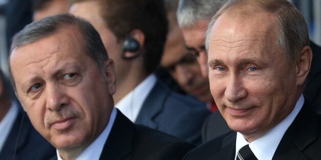 MOSCOW, RUSSIA - SEPTEMBER 23: Russian President Vladimir Putin (R) and Turkish President Tayyip Erdogan attend an opening ceremony for the newly restored Moscow Cathedral Mosque on September 23, 2015 in Moscow, Russia. (Photo by Sasha Mordovets/Getty Images)