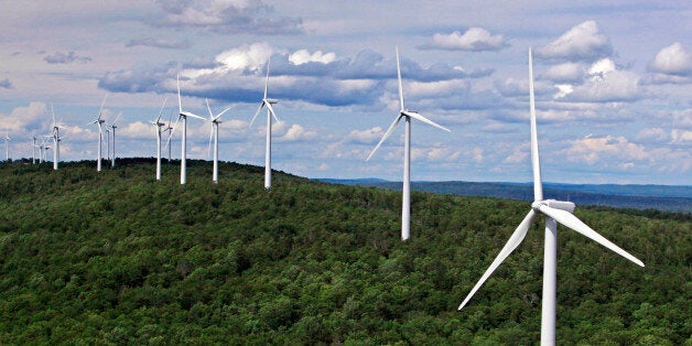 FILE- In this file photo made July 14, 2009, wind turbines line a ridge on Stetson Mountain in Stetson, Maine. The state now