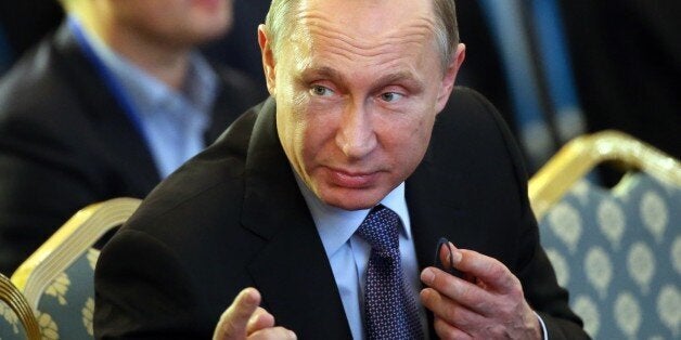 MOSCOW, RUSSIA - OCTOBER 21: Russian President Vladimir Putin attend the 2015 World Olympians Forum on October 21, 2015 in M
