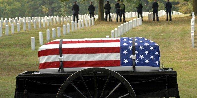 a caisson awaits burial at...