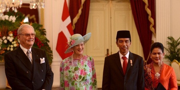 JAKARTA, INDONESIA - OCTOBER 22: Denmark's Queen Margrethe II (L 2) and her husband Prince Henrik Consort (L) meet Indonesian President Joko Widodo (R 2) and First Lady Iriana Joko Widodo (R) after arriving at Presidential palace in Jakarta, Indonesia on October 22, 2015. The Danish royal couple is on a five-day visit to the country. (Photo by Azqa Harun/Anadolu Agency/Getty Images)