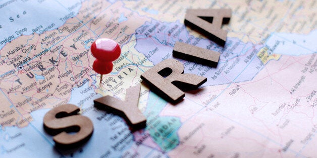 Country name Syria written on global map with wooden letters and straight pin. This photo may use as travel background. Straight pin are pinned on significant countries.