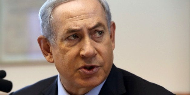Israeli Prime Minister Benjamin Netanyahu chairs the weekly cabinet meeting at his Jerusalem office on October 25, 2015. AFP