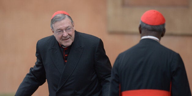 VATICAN CITY, VATICAN - MARCH 11: Cardinal George Pell (L) and Cardinal Francis Arinze arrive for the final congregation bef